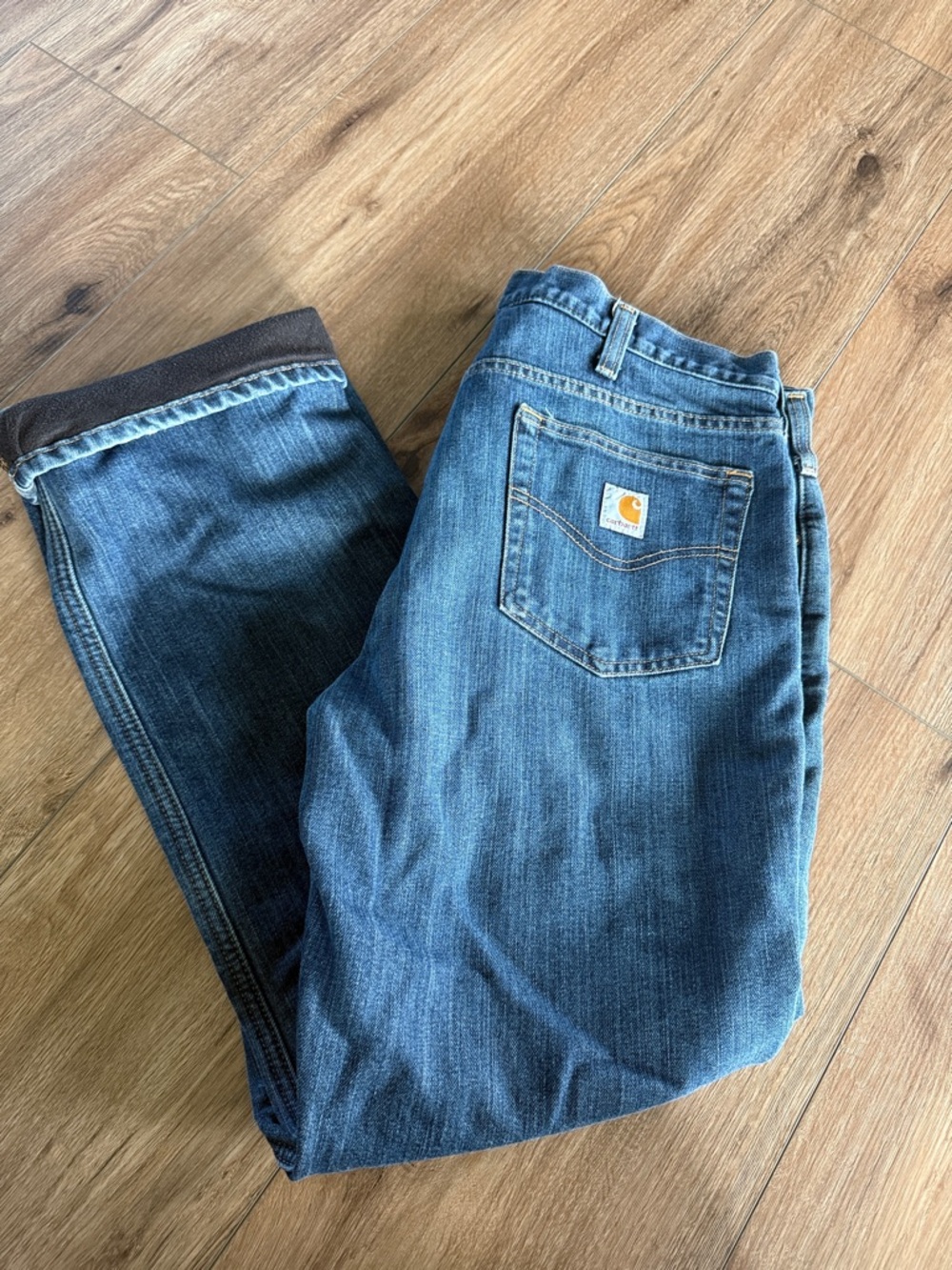 Carhartt Men’s Denim Relaxed Fit Jeans in Blue with Tan Logo Patch- lined!